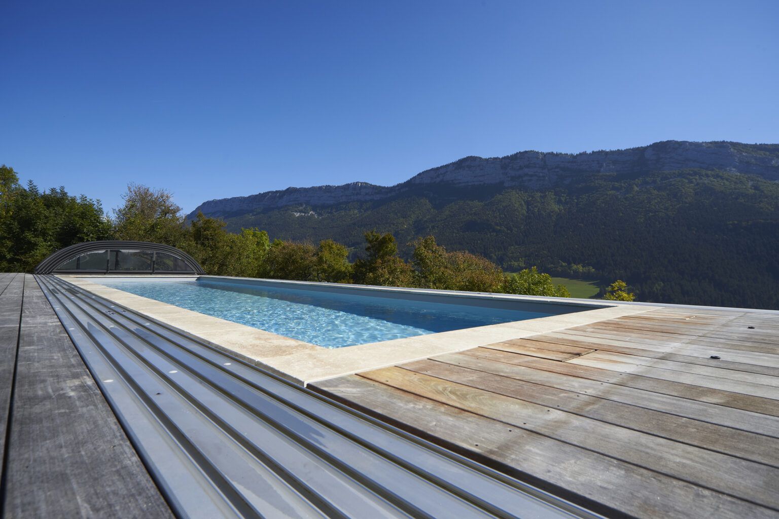 Abri de piscine mi-haut telescopique